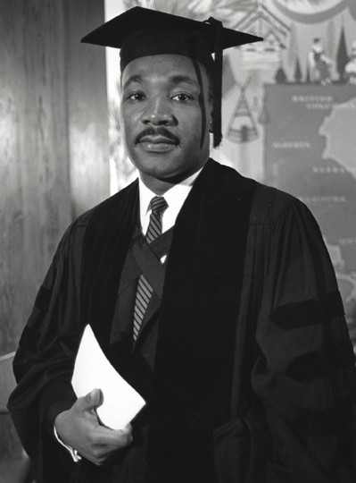 MLK Jr. at age 25 wearing his graduation robes from Boston University where he received his doctorate degree.